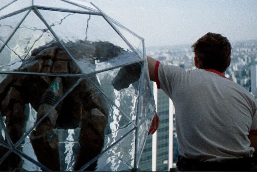 Ryan Gosling as Ryland Grace next to alien Rocky in Project Hail Mary.